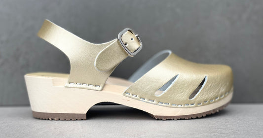 Britta, träsko, guld metallic